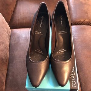 Brown Rockport leather heals